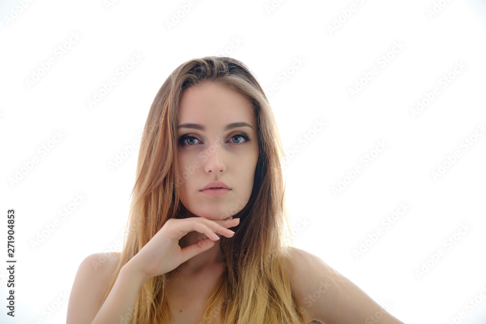 Fototapeta premium Photograph of a portrait of a beautiful fashionable beauty woman girl with long dark flowing hair, isolate on a white background. She is standing in different poses and smiling.