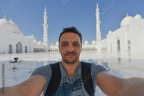 Photography Young man's selfie at a mosque on a sunny day.