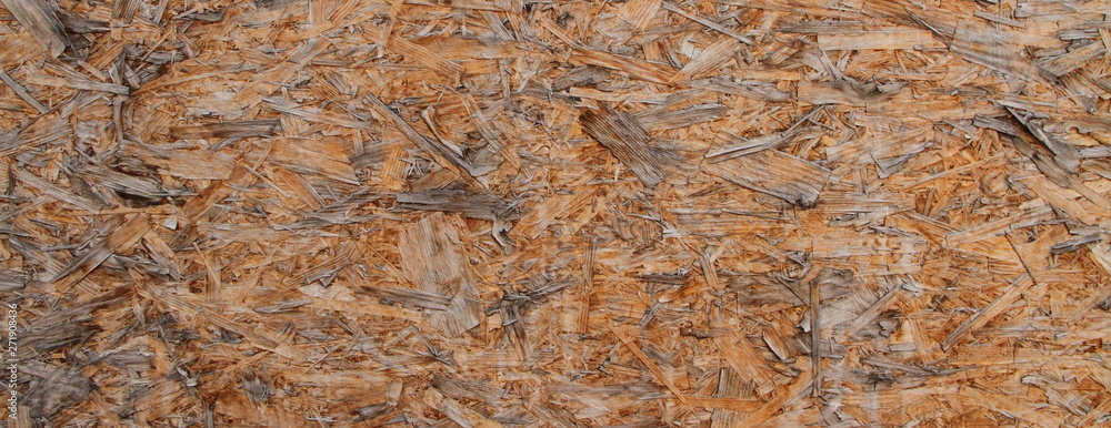 eine alte verwitterte OSB-Platte eine alte verwitterte OSB-Platte