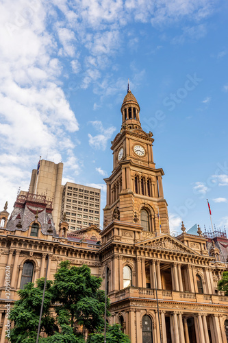 The beautiful Town Hall of Sydney  Australia  against the blue sky with some clouds