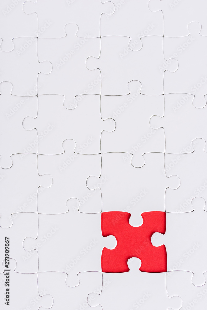 top view of white connected puzzles with red shape top view of white connected puzzles with red shape