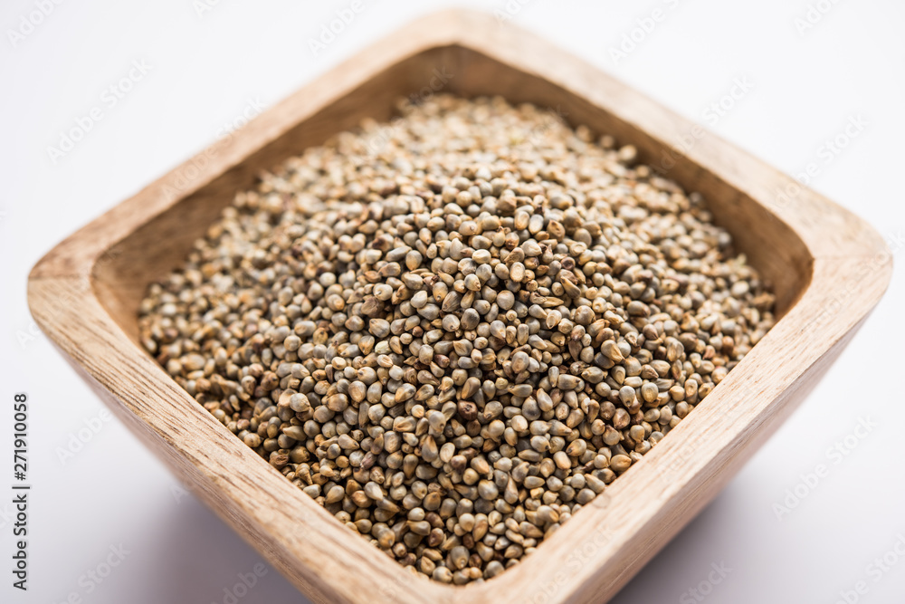 Pearl Millet or Bajra seeds also known as sorghum, in a bowl, selective focus Pearl Millet or Bajra seeds also known as sorghum, in a bowl, selective focus