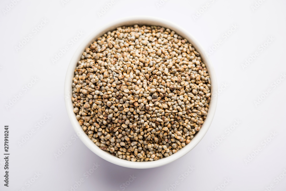 Pearl Millet or Bajra seeds also known as sorghum, in a bowl, selective focus Pearl Millet or Bajra seeds also known as sorghum, in a bowl, selective focus