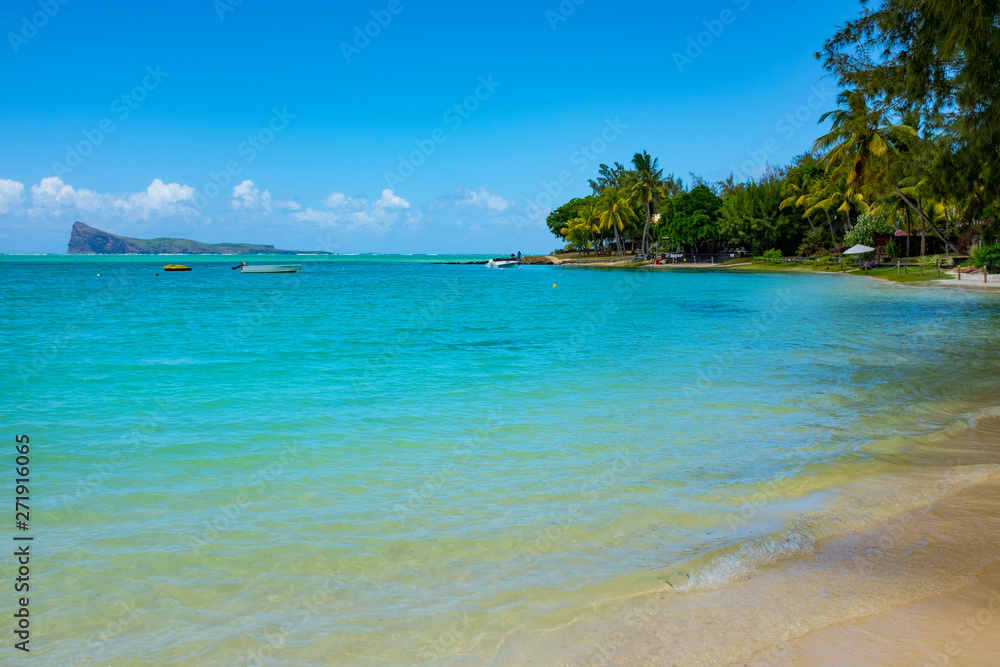 Fototapeta premium Typical tropical beach Mauritius. Relaxing on remote Paradise beach,typical tropical beach at Mauritius island
