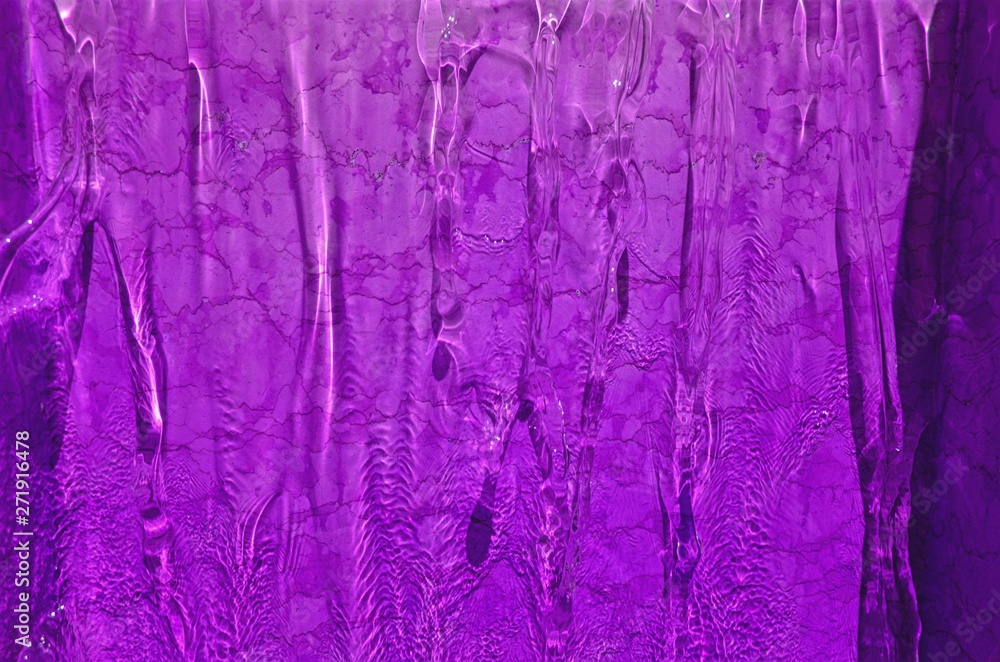 Fototapeta premium background of the water running down the colored surface