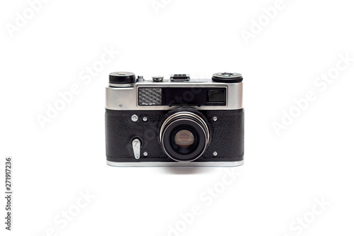 Soviet old camera with leather elements on the body with the lens. Isolate