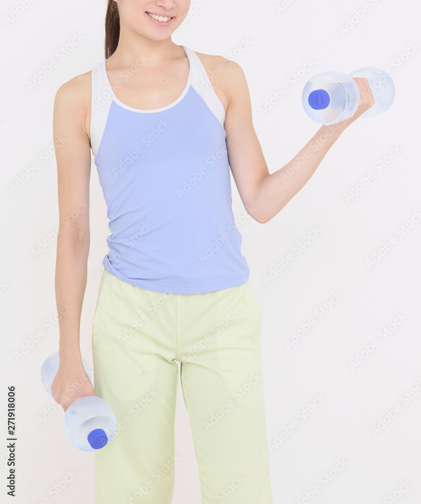 ダンベル体操する女性 ダンベル体操する女性