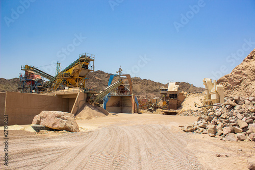 poor factory iron rusty digging machines and industrial production lines in dry desert nature scenic environment  one of global pollution and warming reason picture 