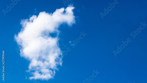 bright blue sky with white clouds. Great background with copyspace