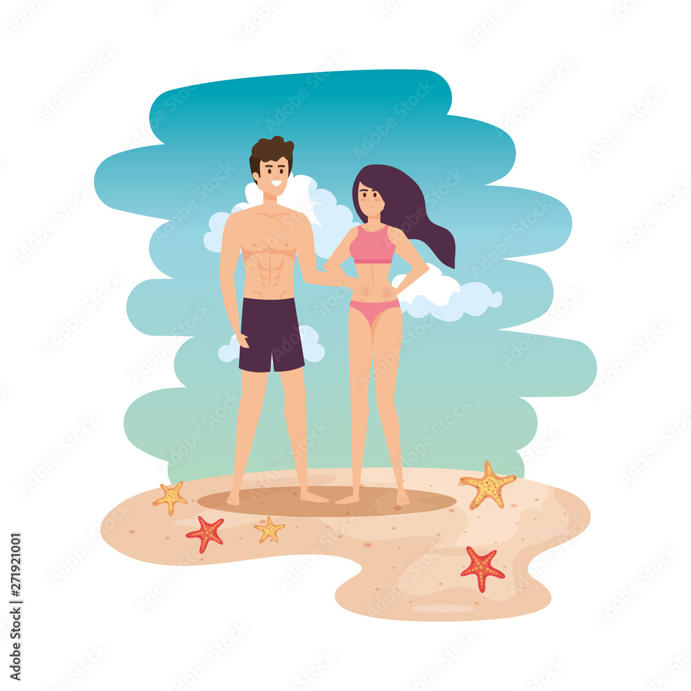 young couple with swimsuit on the beach