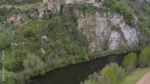 Ancient village Saint-Cirq-Lapopie in Midi-Pyrenees, Quercy region in southern France photo