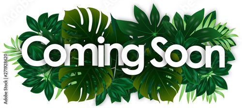 Coming soon word and green tropical’s leaves background photo