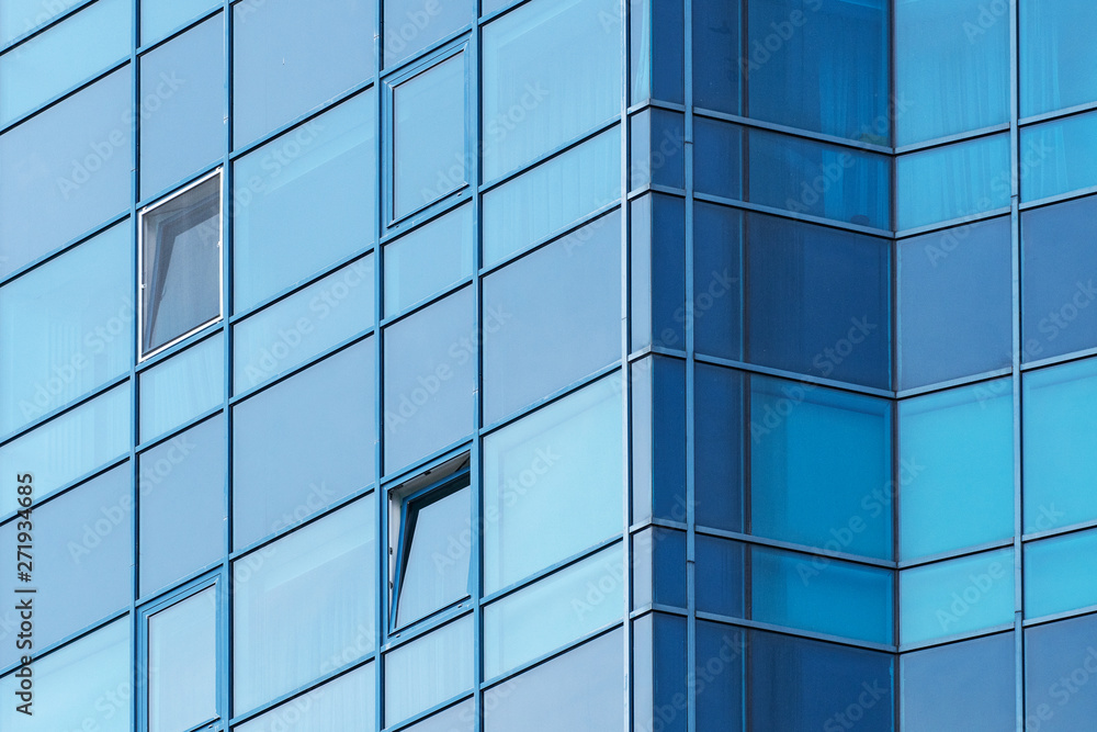 background of glass windows of modern office building background of glass windows of modern office building