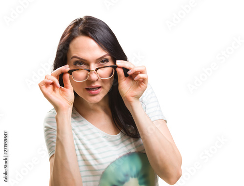 Woman with her glasses lifted up can t see