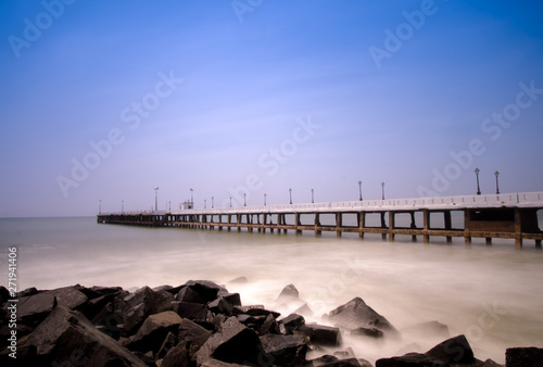 Old pier at Promenade Beach. Rock Beach is the popular stretch of beachfront in the city of Puducherry, India, along the Bay of Bengal