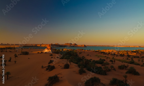 Fototapeta Naklejka Na Ścianę i Meble -  Aerial sunrise Panoramic view to Yoa lake group of Ounianga kebir lakes at the Ennedi, Chad