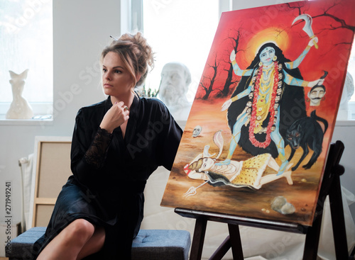 Classy creative painter in her studio photo