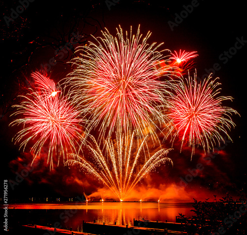 Fireworks fired above the water surface of the dam