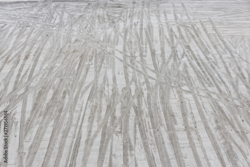 Multiple tire thread imprint on sandy surface