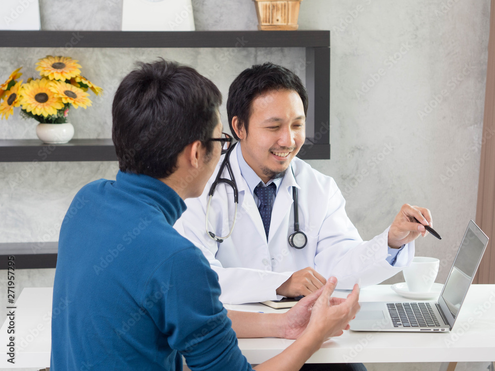 Doctor diagnosis sickness about patient on laptop in clinic Doctor diagnosis sickness about patient on laptop in clinic