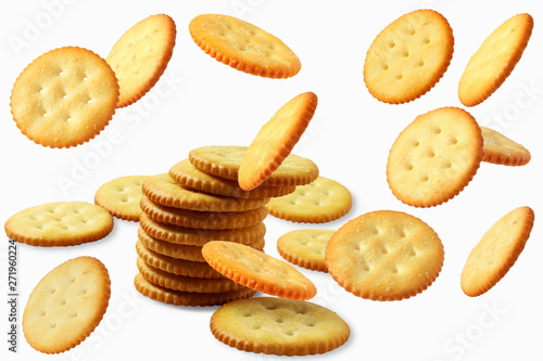 Vászonkép Top view of round salted snack cracker cookie isolated on white background
