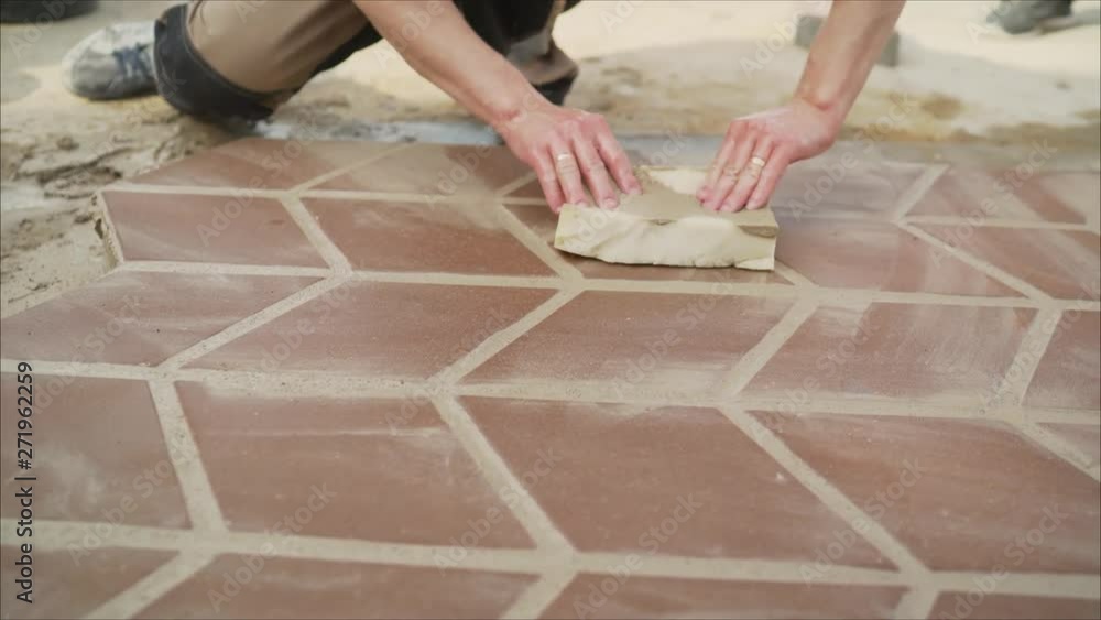 Wash paving slabs.. Contrast between patio paving slabs which have been