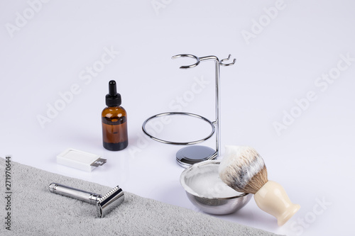 Traditional wet shaving. Shaving brush, safety razor, beard oil and soap.
