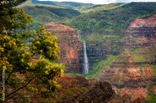 Waipo'o Falls, Waimea Canyon, Kauai, Hawaii. Waipo'o Falls is a fantastic waterfall on Kokee Stream dropping 800 ft. in two tiers. It is located in the heart of the Waimea Canyon.