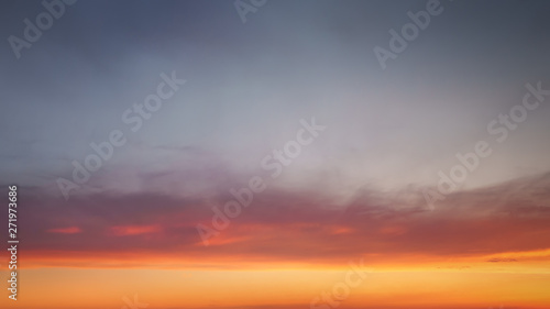 cloudscape at sunset with beautiful sky gradient and some clouds © mimadeo