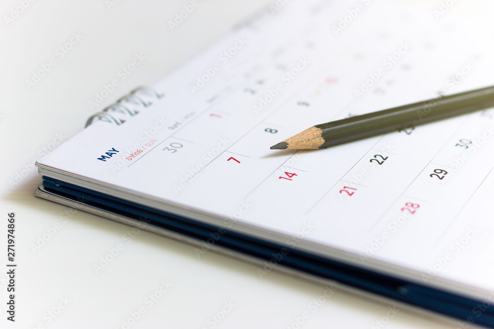 Closeup image of pencil on the calendar. Closeup image of pencil on the calendar.