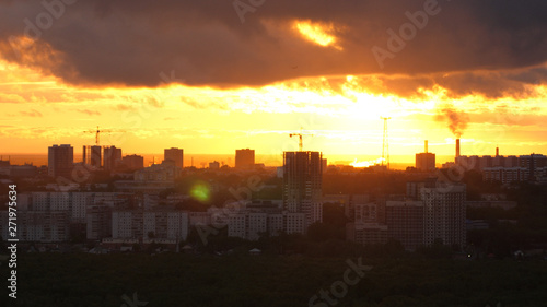 Sunset over city  close up on modern downtown Novosibirsk skyline buildings
