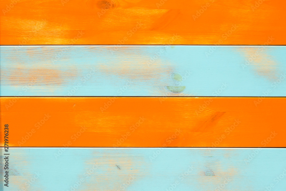 Decorative and colorful wood wall paint orange and blue stripe, backgraund.