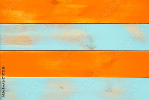 Decorative and colorful wood wall paint orange and blue stripe, backgraund.
