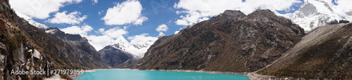turquoise lake in the andes mountains in peru photo