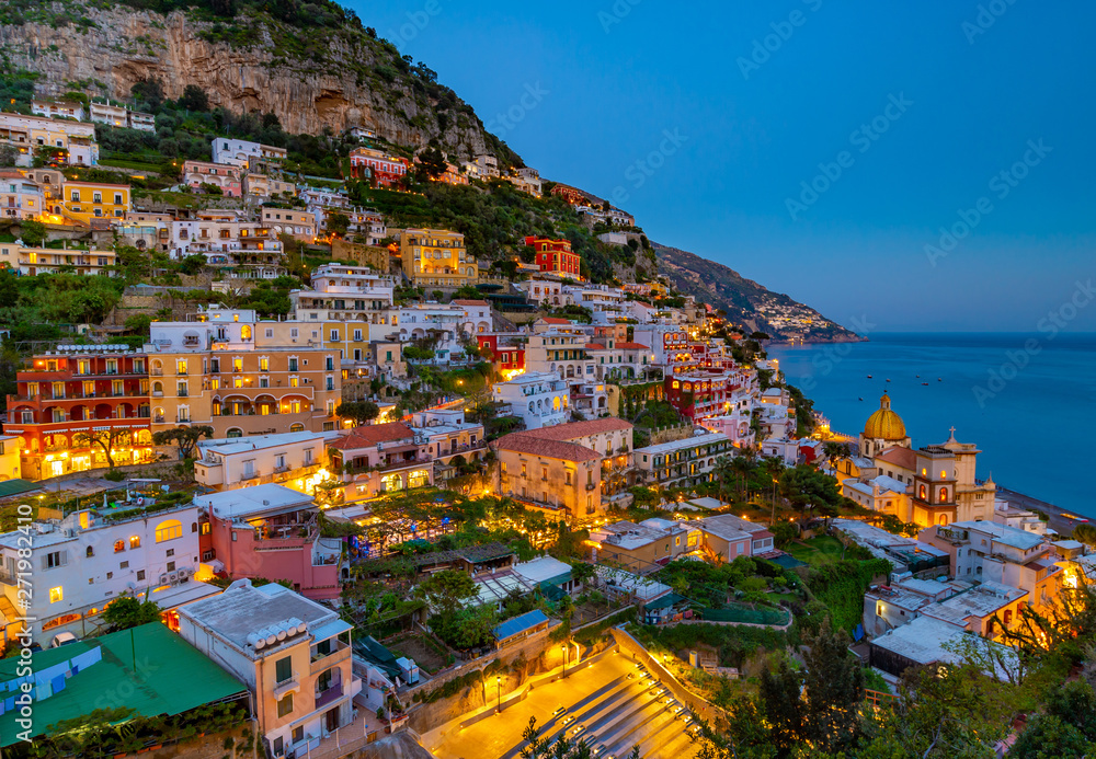 Panoramic view of the beach anf colorful buildings in Positano at  Amalfi Coast, Italy.