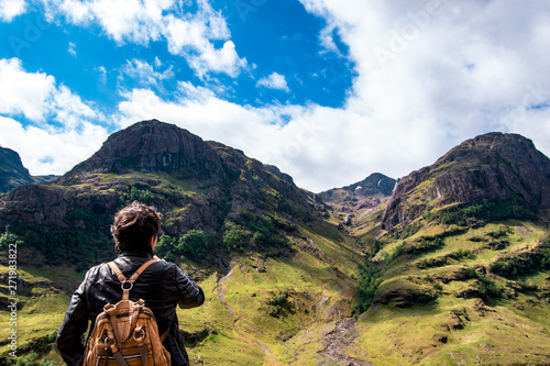 Panoramic view of the Three Sisters of Glencoe with tourist, Scotland, UK.