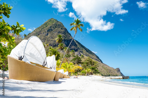 Tropical beach with beach chairs on the beach Saint Lucia, St lucia beach with tropical beach chairs luxury vacation Sugar beach