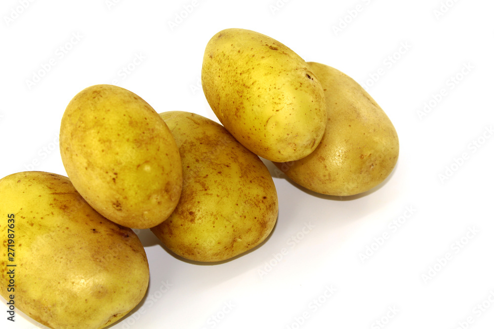 Young potatoes clean on white background, five pieces Young potatoes clean on white background, five pieces