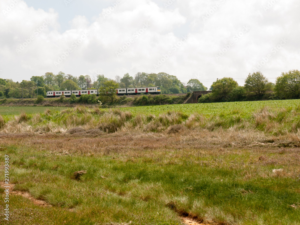 train riding through countryside scene on tracks travel background train riding through countryside scene on tracks travel background