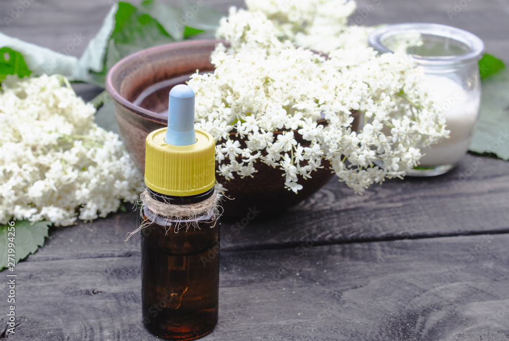 Elderberry bottled oil, fresh flowers. Elderberry bottled oil, fresh flowers.