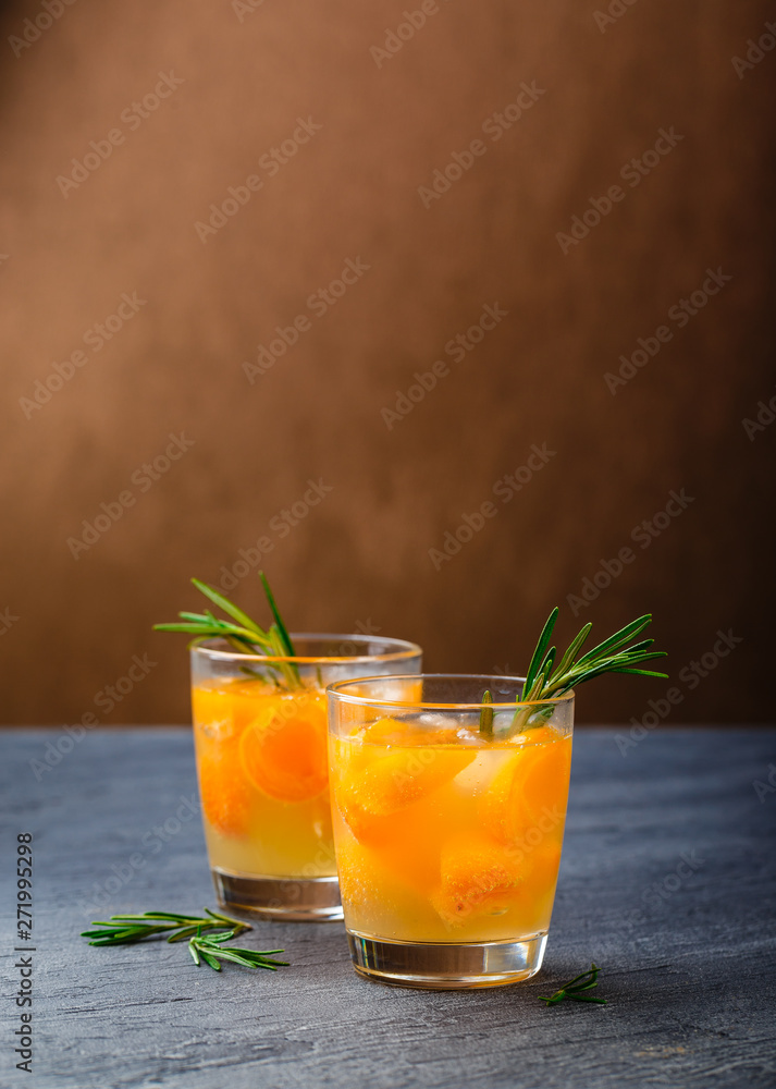 Fototapeta premium Summer drinks, rosemary aprcot cocktails.