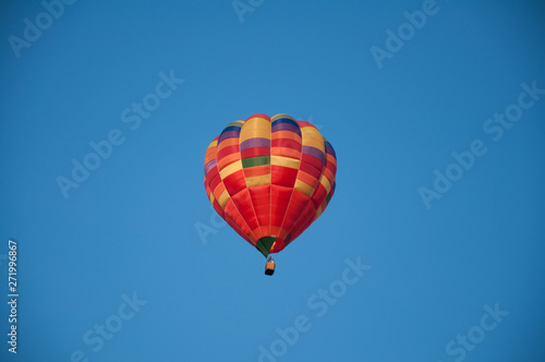 Big balloon. Balloon. Colorful bowl with basket. In the sky soars in the summer  © amdre100