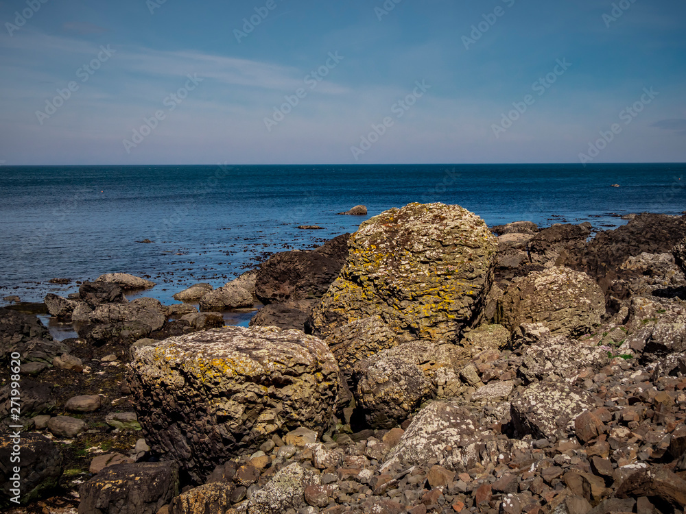 Giants Causeway in North Ireland is a popular landmark at the coast - travel photography