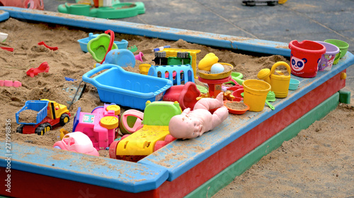 Wallpaper Mural Children's Sandbox. Set Of Colored Plastic Toys On The Sand,  Torontodigital.ca