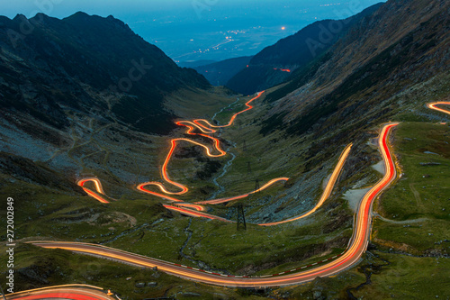 Traffic trails on Transfagarasan pass,rossing Carpathian mountains in Romania, Transfagarasan is one of the most spectacular mountain roads in the world. photo