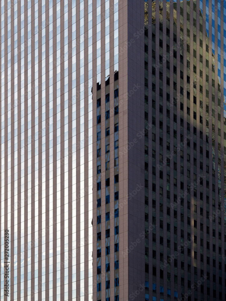 fragment of the facade of a high-rise office building