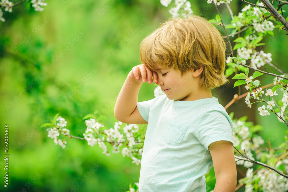 Child on the background of nature. Beautiful boy. Preschooler on green natural background. Kids in the garden. Calm and rest. Relaxation. Renewal. Put thoughts in order. Mental rest. Child on the background of nature. Beautiful boy. Preschooler on green natural background. Kids in the garden. Calm and rest. Relaxation. Renewal. Put thoughts in order. Mental rest.