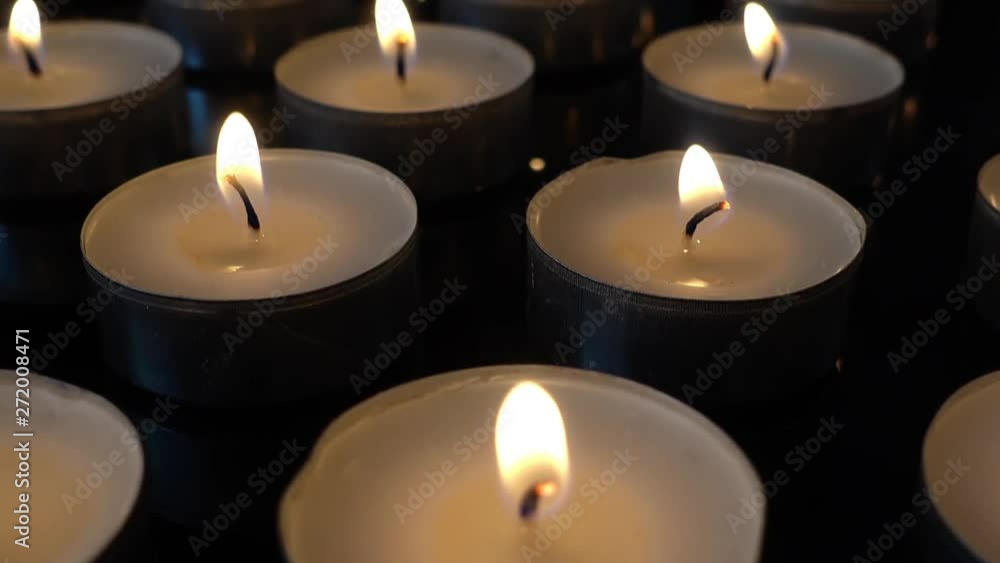 Candles on a black background.