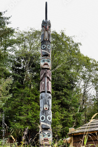 Native American Totem Pole at Totem Bight State Historical Park, Ketchikan, Alaska. Native American tradition. Totem animals act as guardian spirits. © Enrico