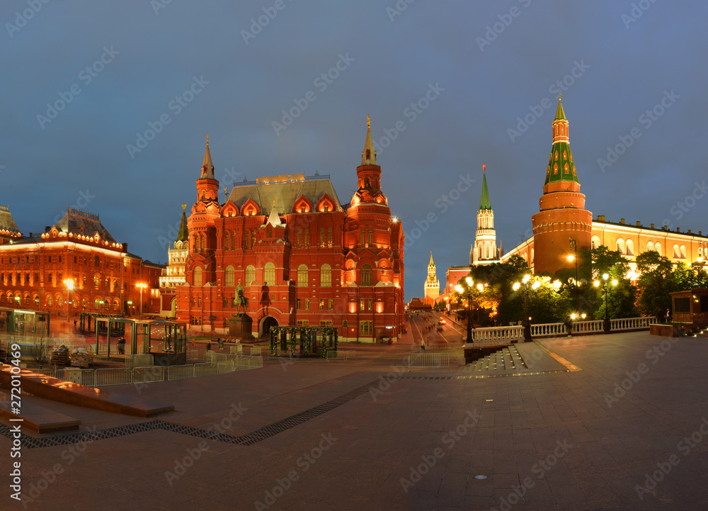 Night view of the historical museum and the Kremlin Arsenal Tower from Manezh Square. Russia, Moscow, May 2019